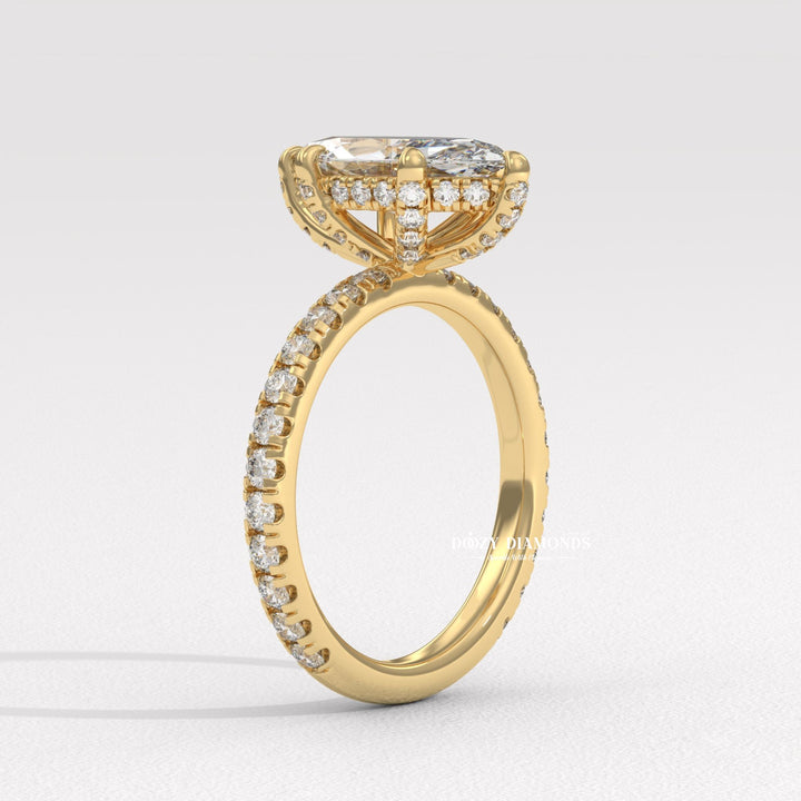 Angled view of marquise cut diamond in solitaire setting