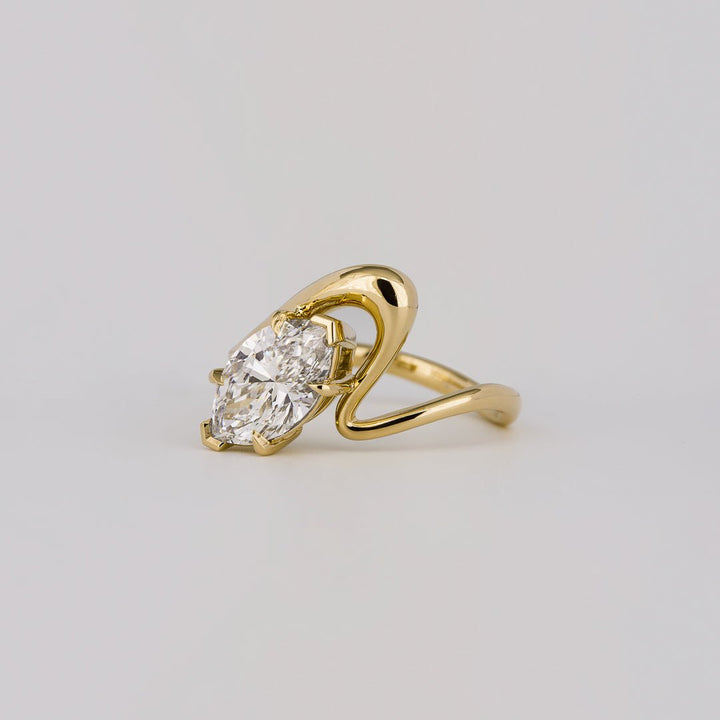 Macro shot of marquise cut diamond facets in solitaire ring setting