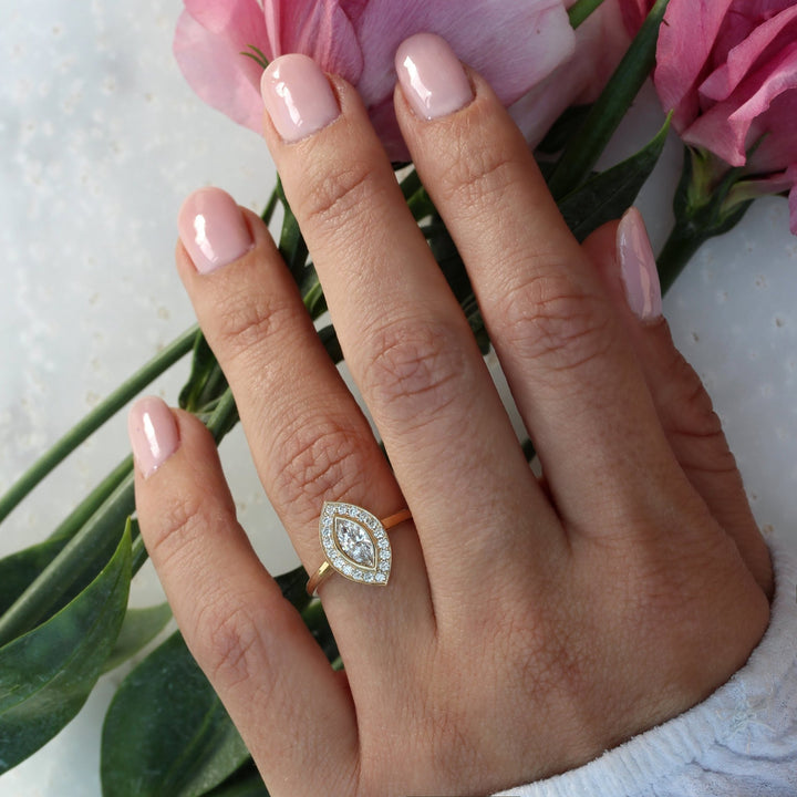 Marquise halo engagement ring with certified lab grown diamond