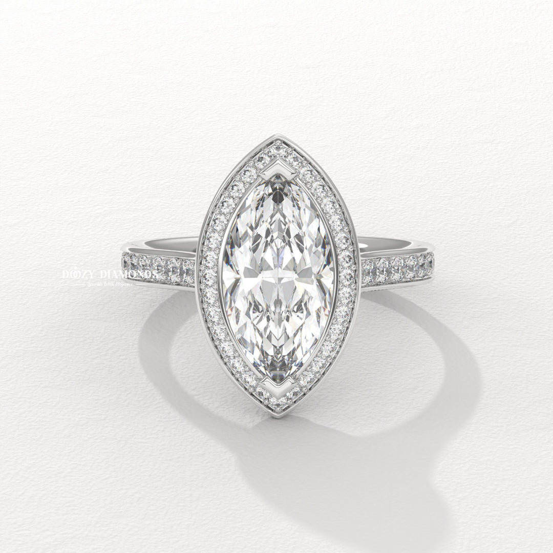 Marquise halo engagement ring finished in polished solid gold