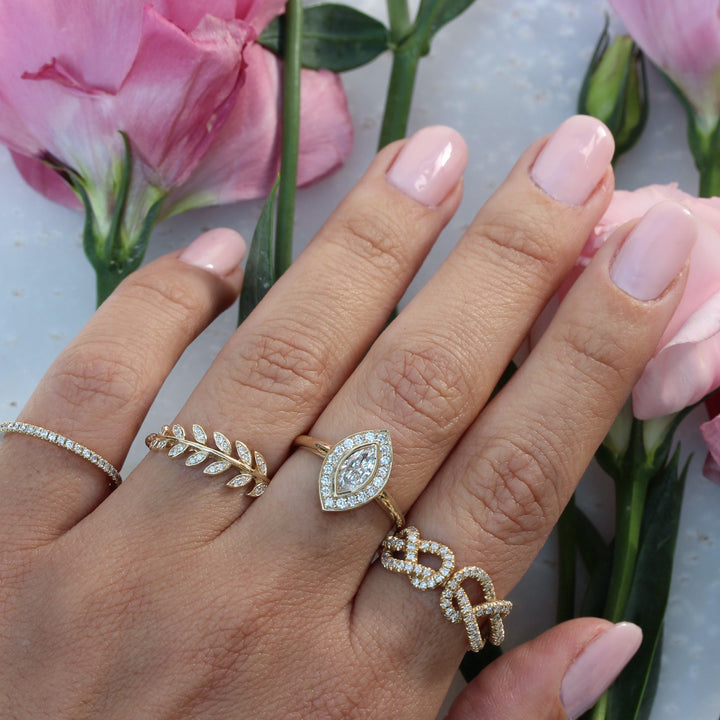 Marquise halo ring set with an IGI graded diamond