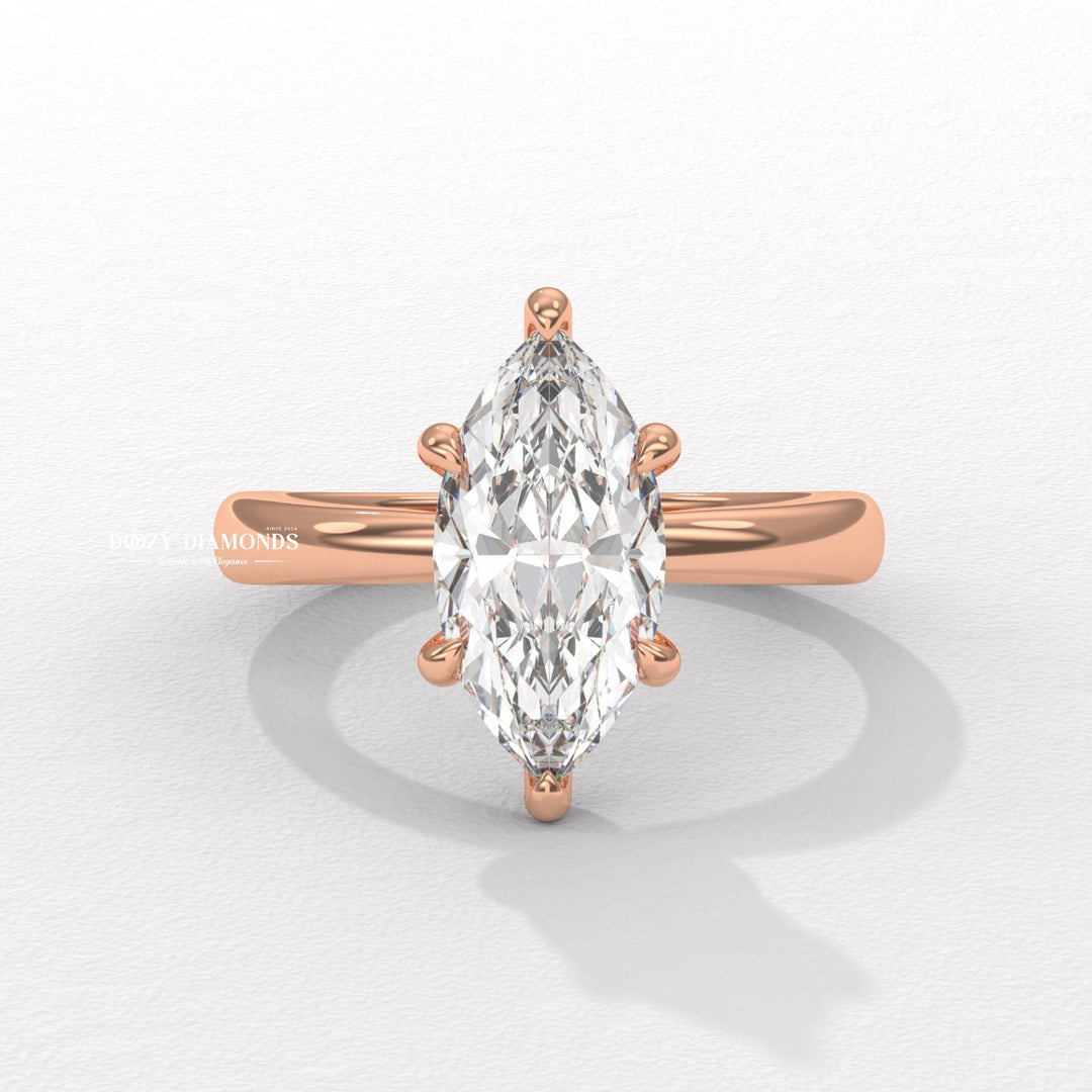 Top-down view of marquise cut hidden halo engagement ring
