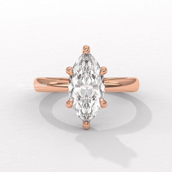 Top-down view of marquise cut hidden halo engagement ring