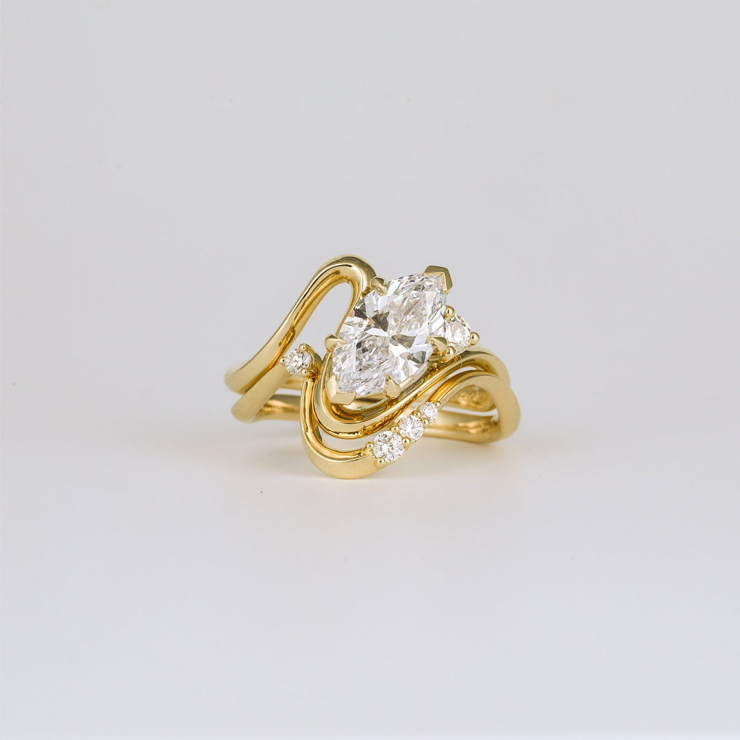 Marquise solitaire engagement ring photographed in natural light