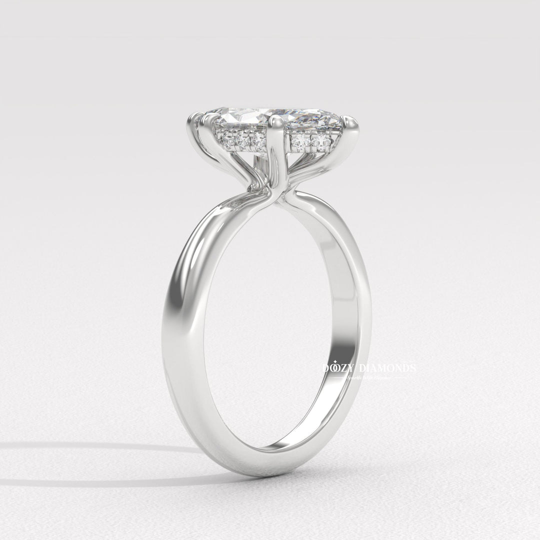 Marquise hidden halo engagement ring close-up highlighting diamond sparkle