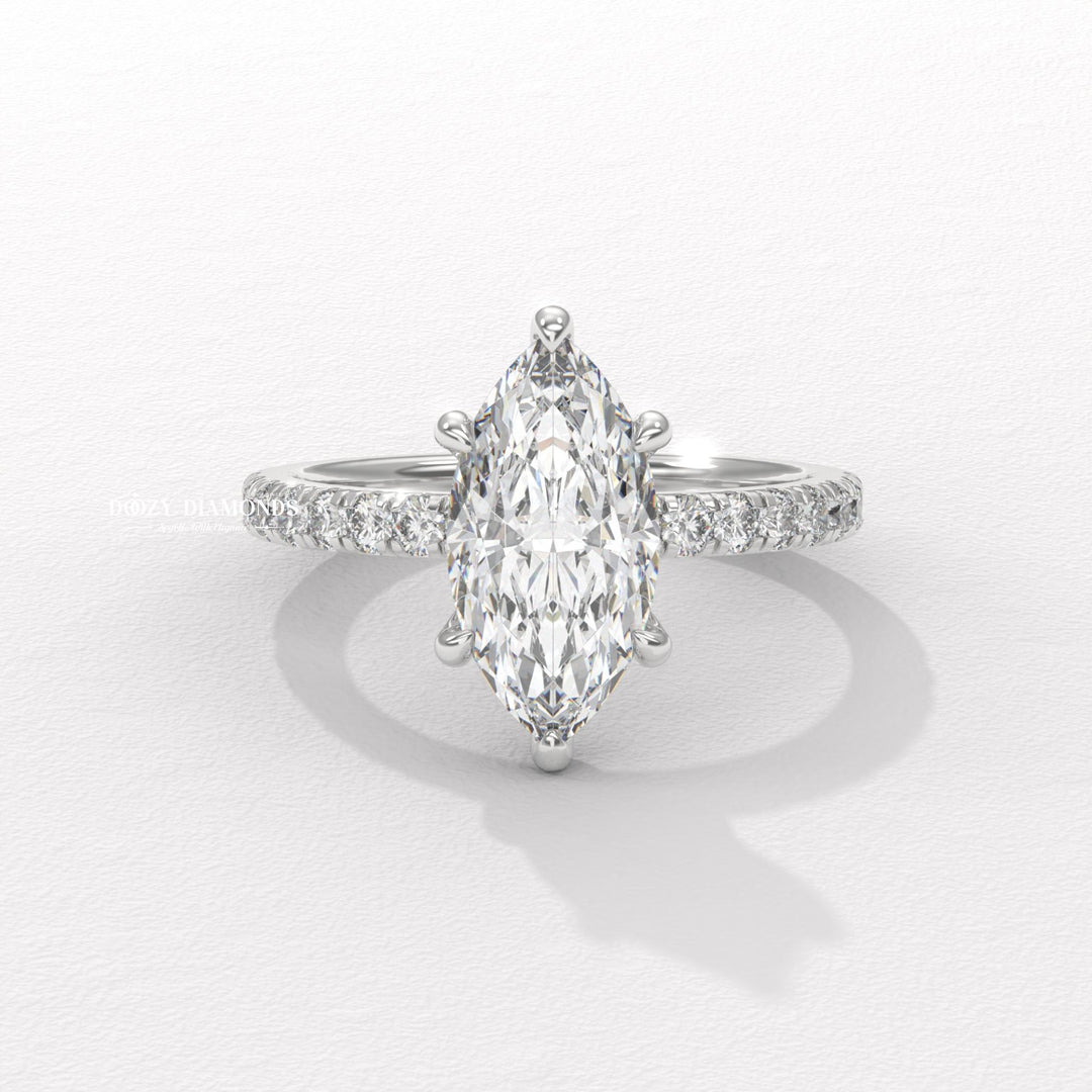 Marquise pave diamond ring displayed on jewelry stand