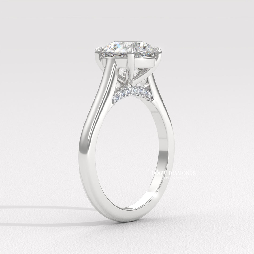 Round solitaire lab grown diamond ring fitted on finger