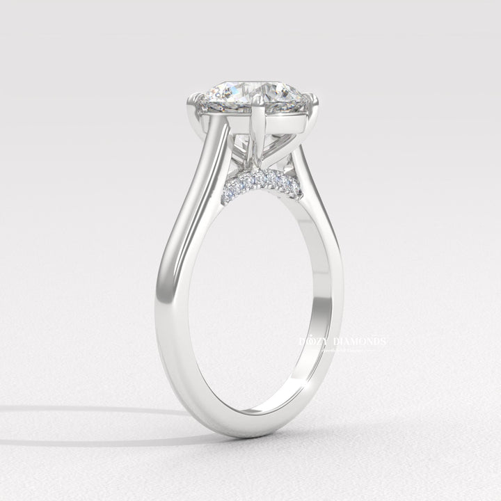Round solitaire lab grown diamond ring fitted on finger