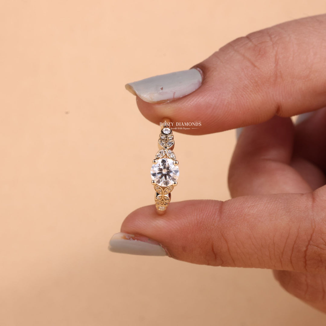 Round cut pave engagement ring shown in real-life wear