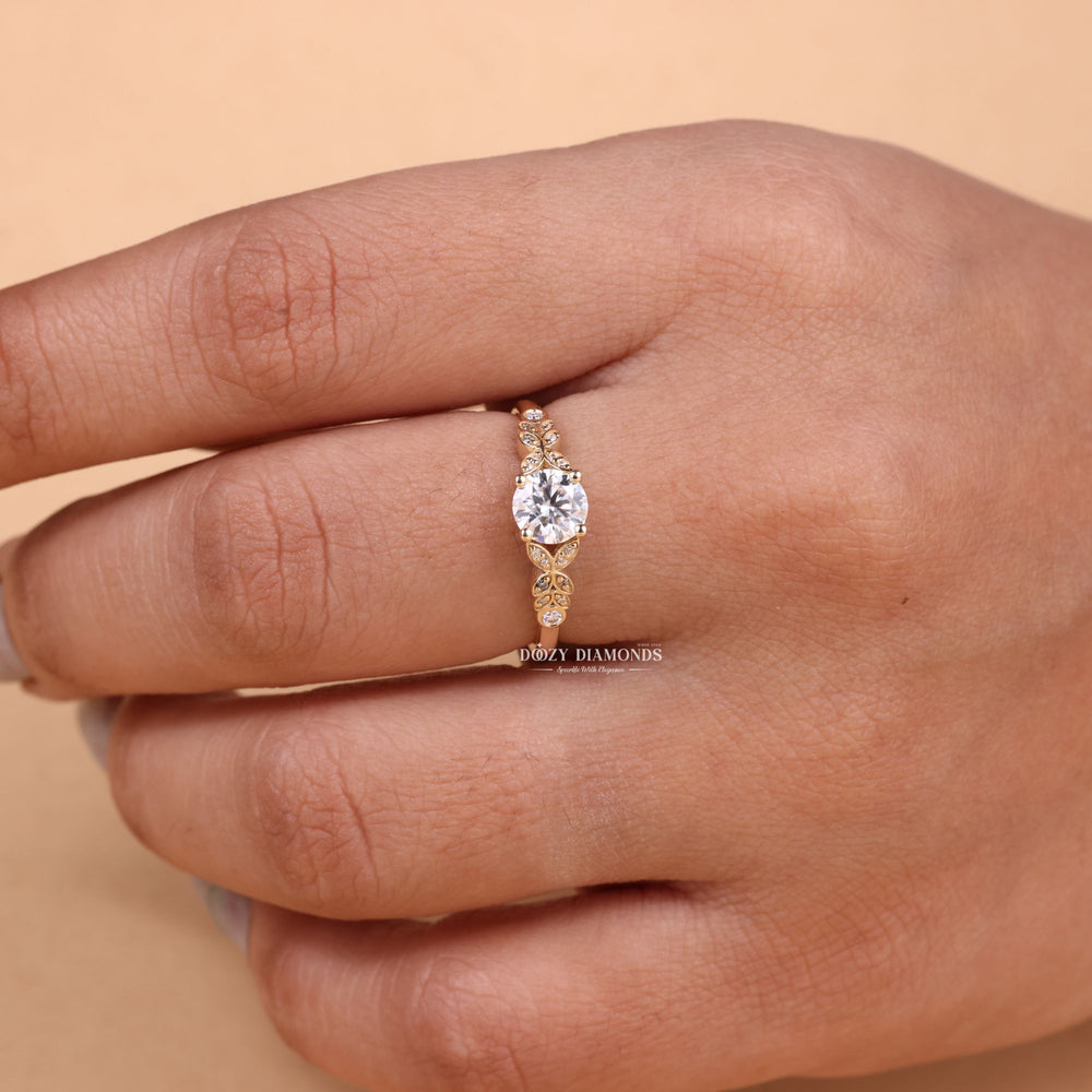 Round pave engagement ring viewed from the side
