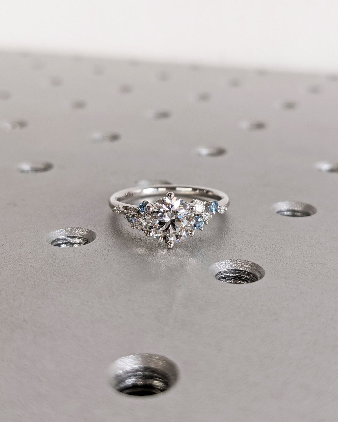 Round cluster lab grown diamond ring side profile in gold setting