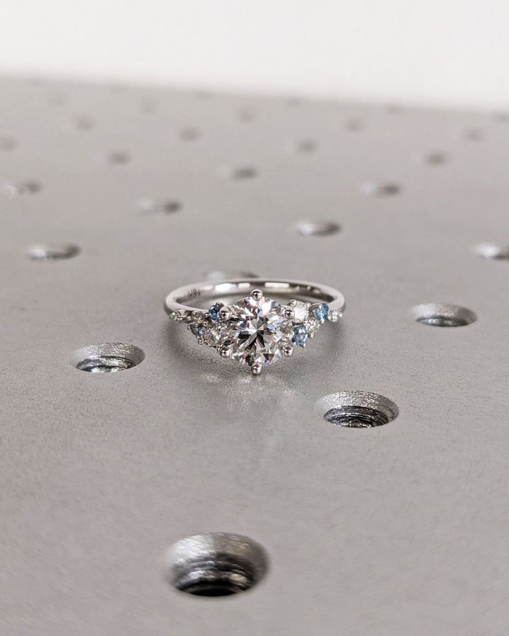 Round cluster lab grown diamond ring side profile in gold setting