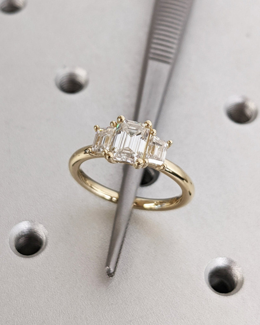 Top-down view of emerald cut solitaire engagement ring