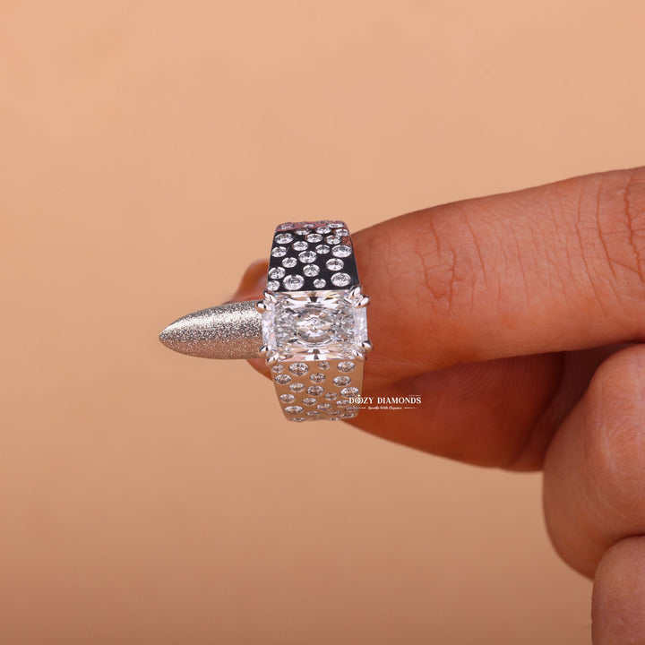 Radiant solitaire engagement ring photographed in natural light