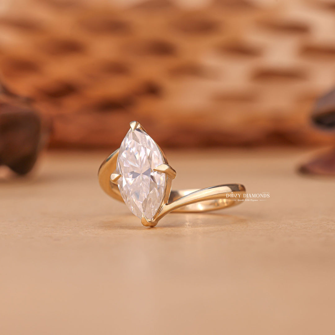 Marquise solitaire engagement ring with brilliant diamond sparkle