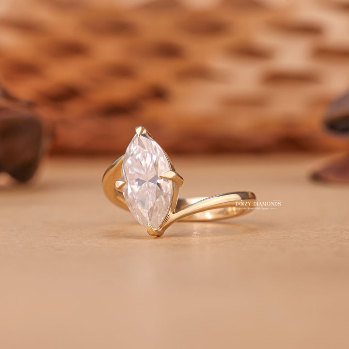 Marquise solitaire engagement ring with brilliant diamond sparkle