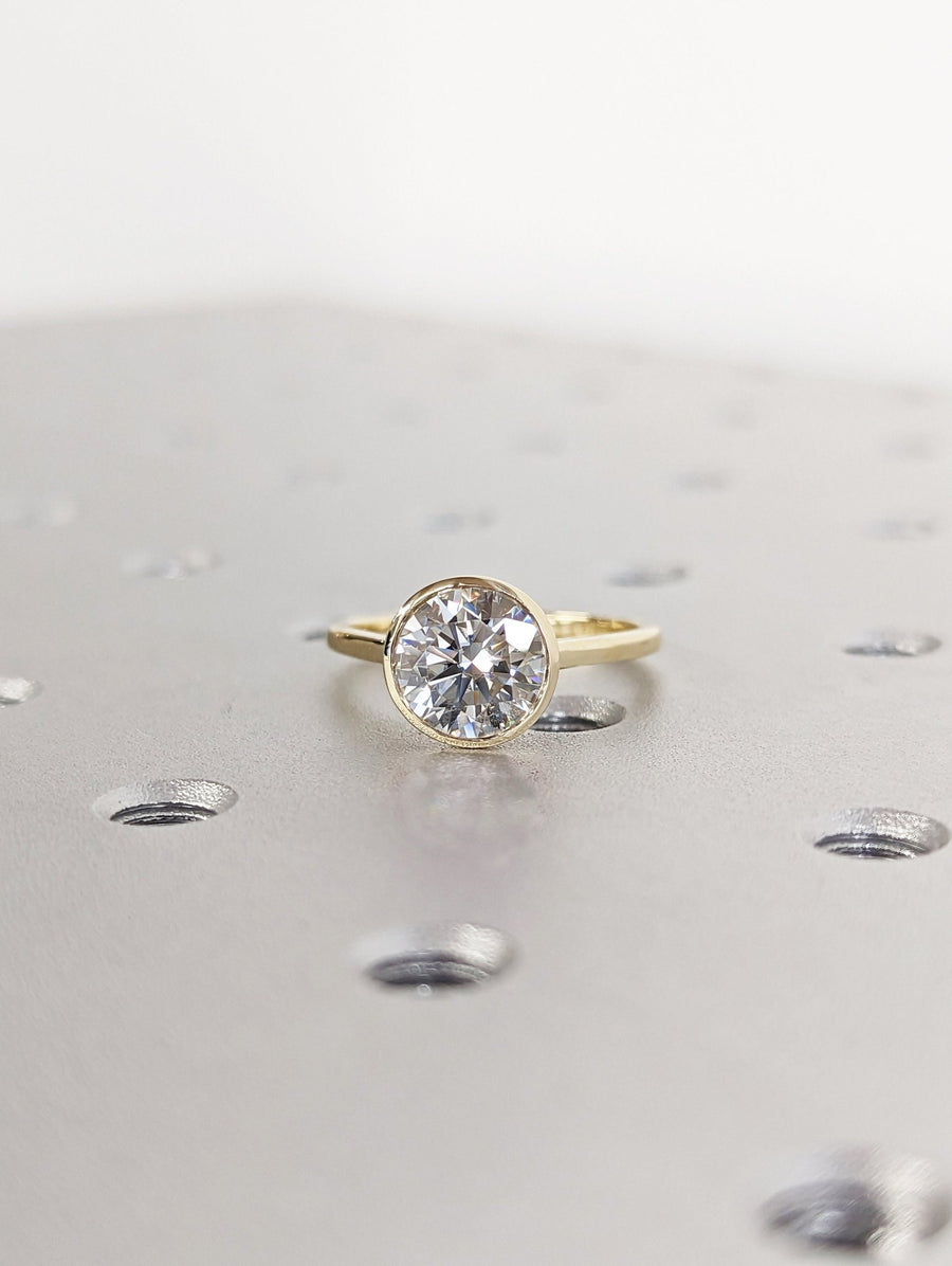 Discover round bezel lab grown diamond engagement ring online