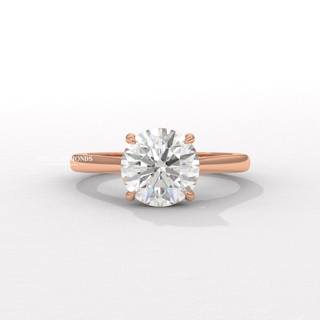 Profile view of round cut hidden halo engagement ring band