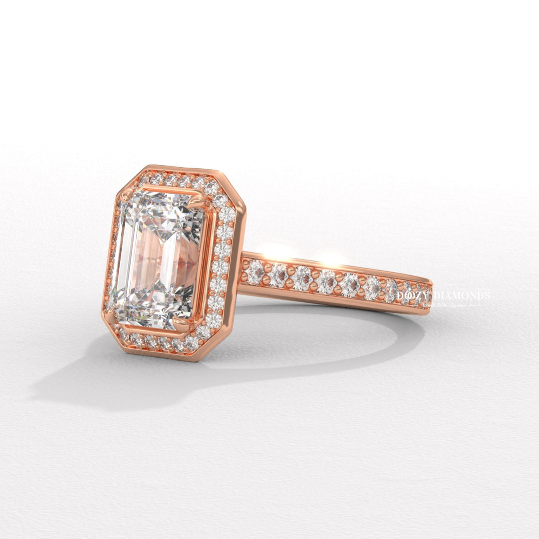 Emerald cut diamond ring worn on hand