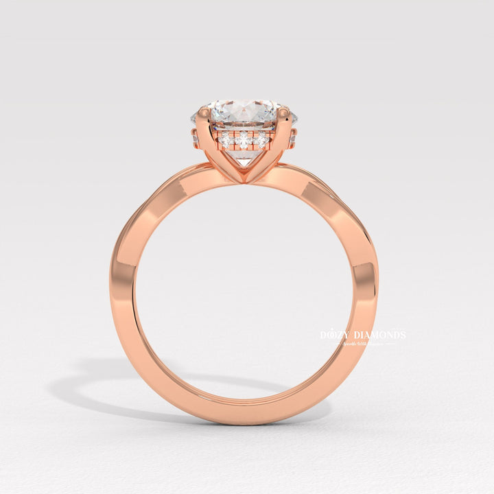 Round solitaire engagement ring finished in polished solid gold