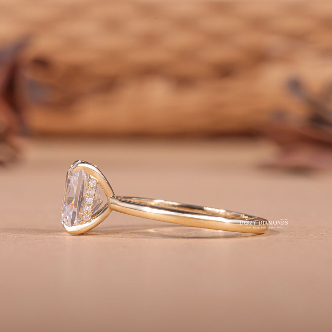 Profile view of cushion cut hidden halo engagement ring band