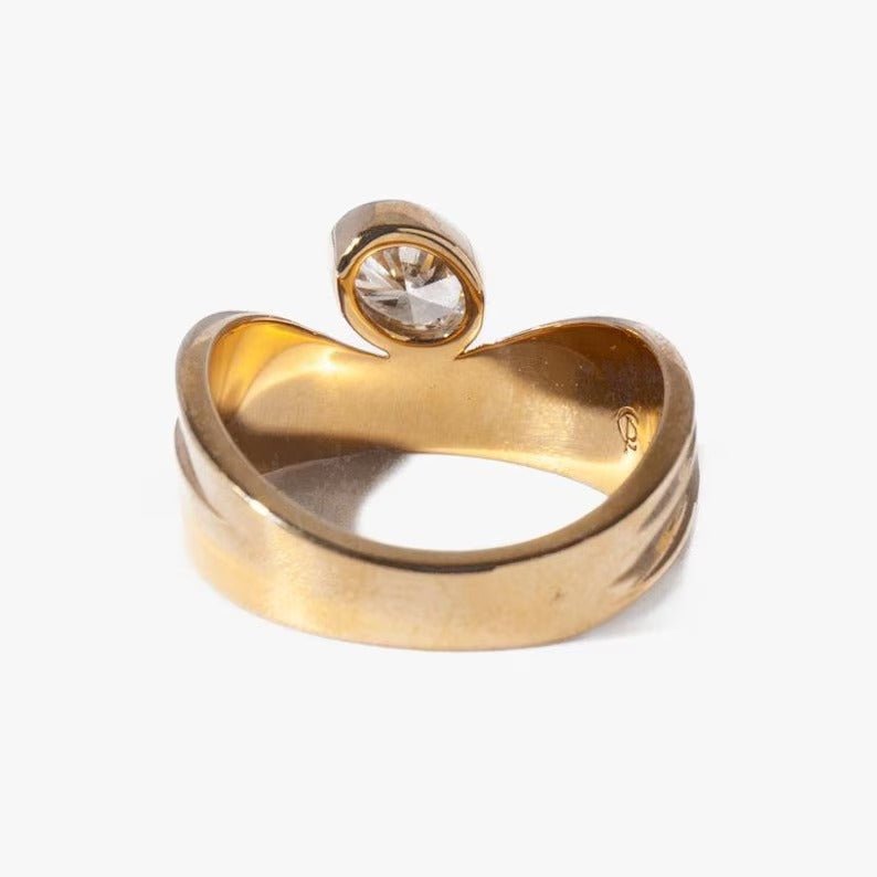 Side angle of oval bezel diamond engagement ring