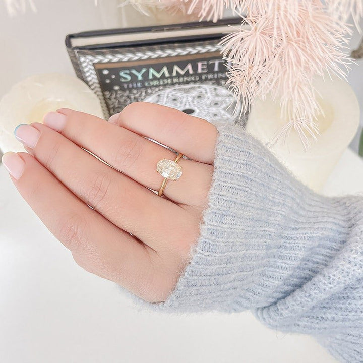Oval solitaire engagement ring with certified lab grown diamond