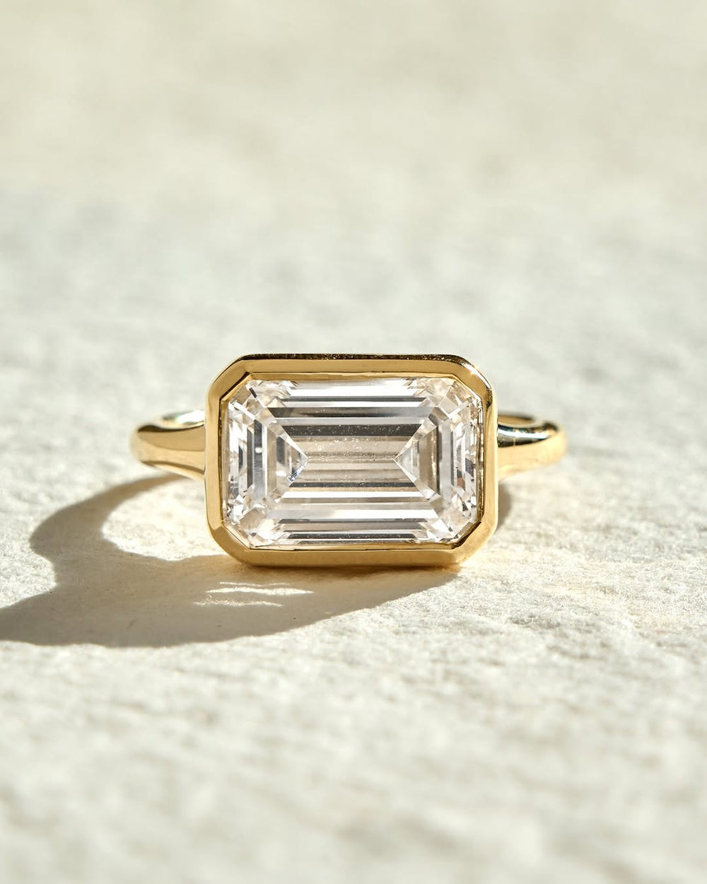 Shop emerald cut bezel lab grown diamond engagement ring online