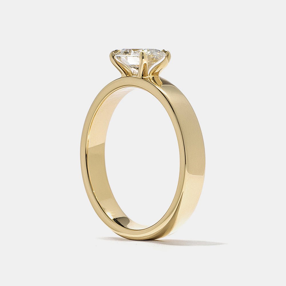 Oval east west engagement ring viewed from the side