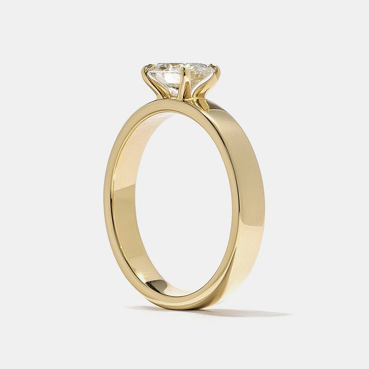 Oval east west engagement ring viewed from the side