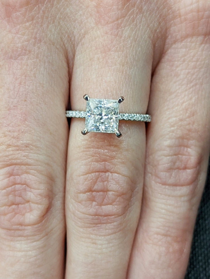 Princess pave engagement ring viewed from the side