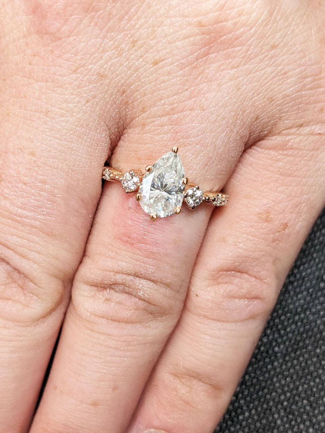Premium pear cut cluster engagement ring crafted in solid gold