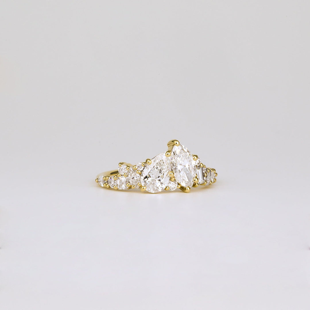 Classic pear cluster engagement ring crafted for everyday wear