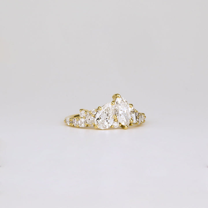 Classic pear cluster engagement ring crafted for everyday wear