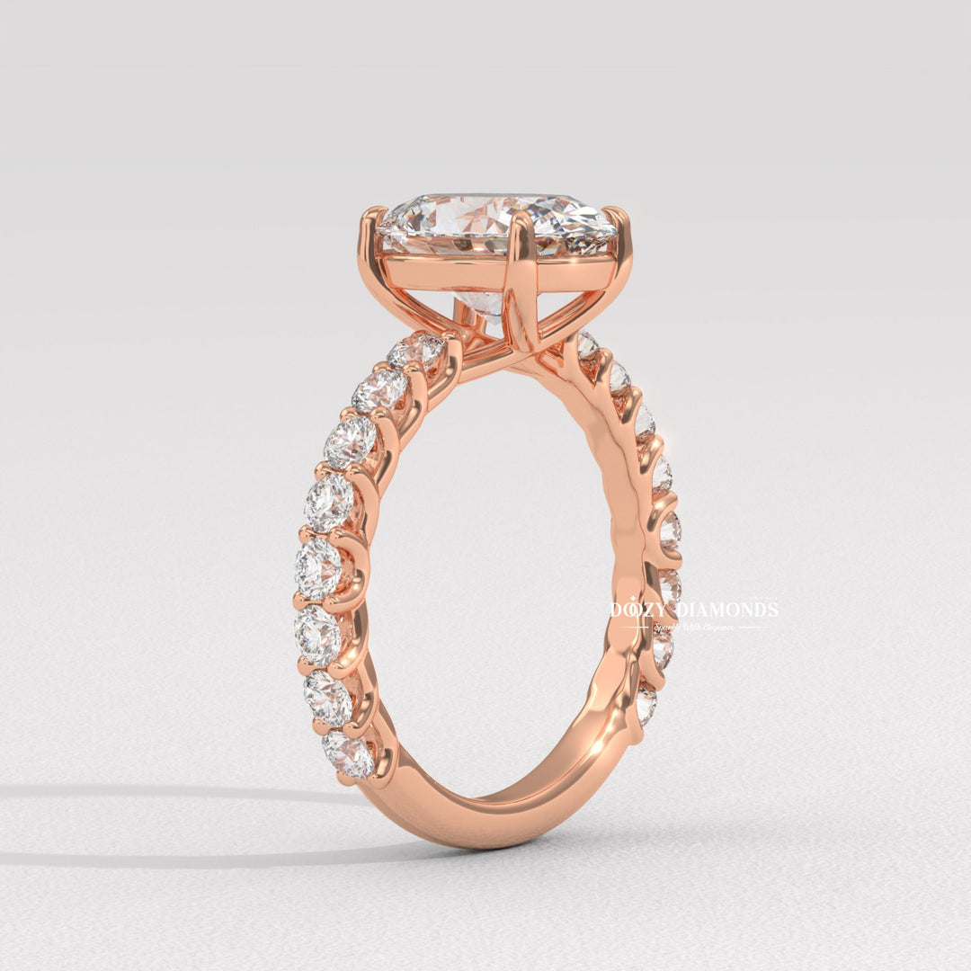 Side angle of oval pave diamond engagement ring