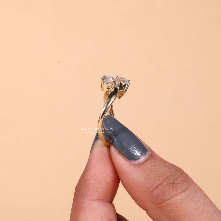 Angled view of oval cut diamond in solitaire setting
