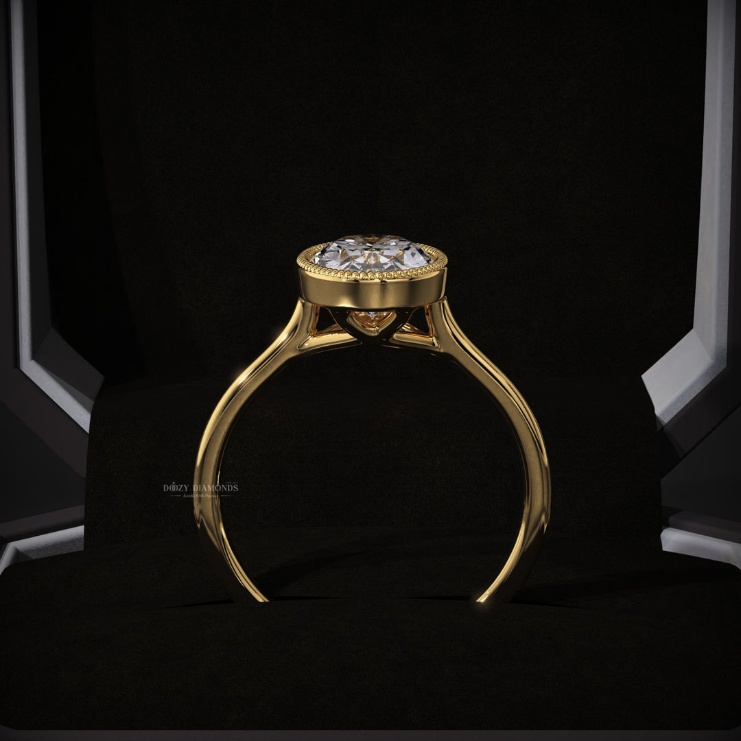 IGI certified oval cut diamond in bezel engagement ring setting