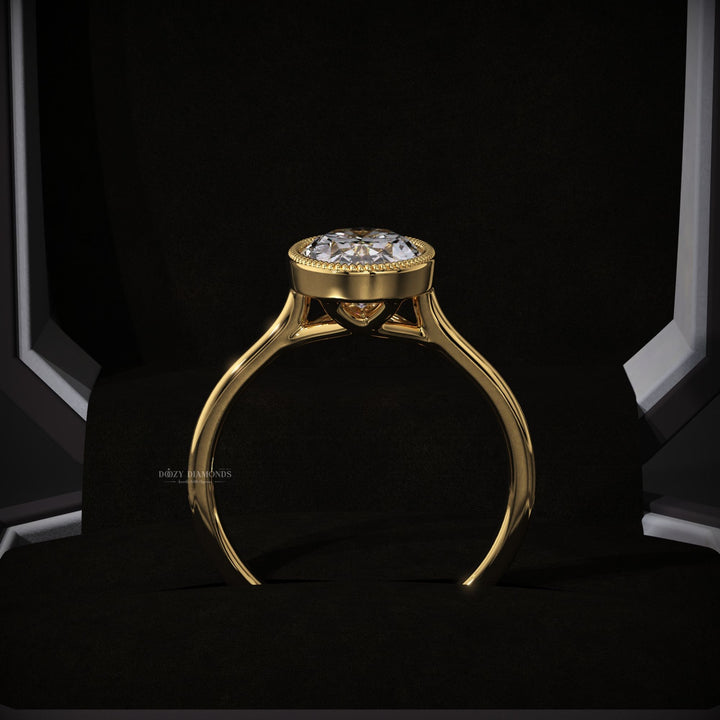 IGI certified oval cut diamond in bezel engagement ring setting