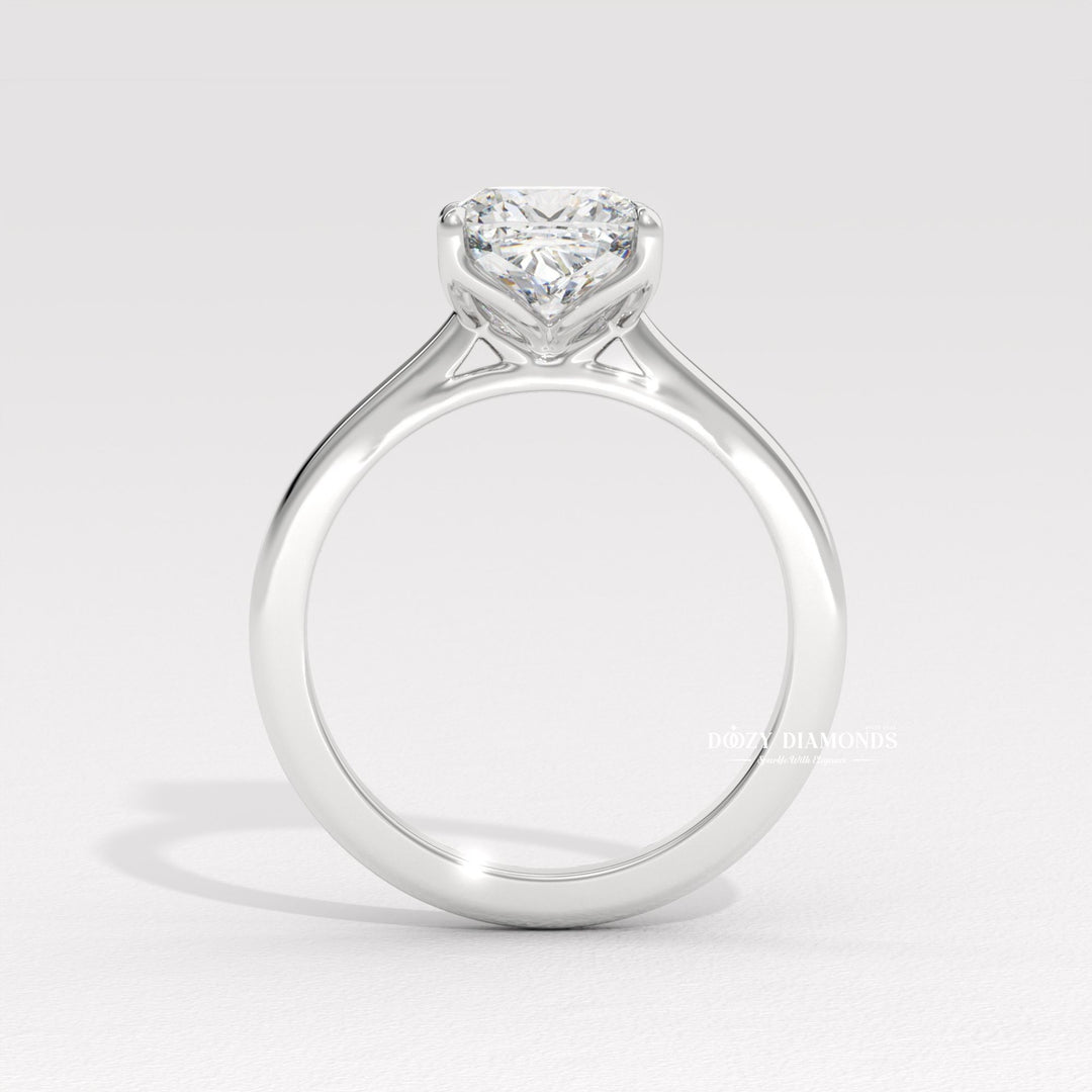 Close-up of cushion cut center diamond in solitaire engagement ring