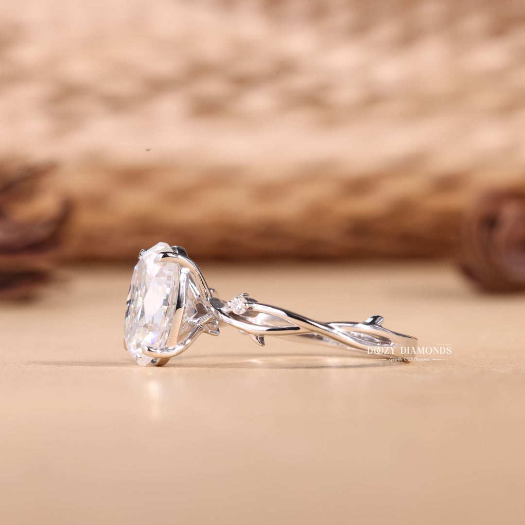 Oval solitaire engagement ring close-up showing E/VS1 diamond clarity