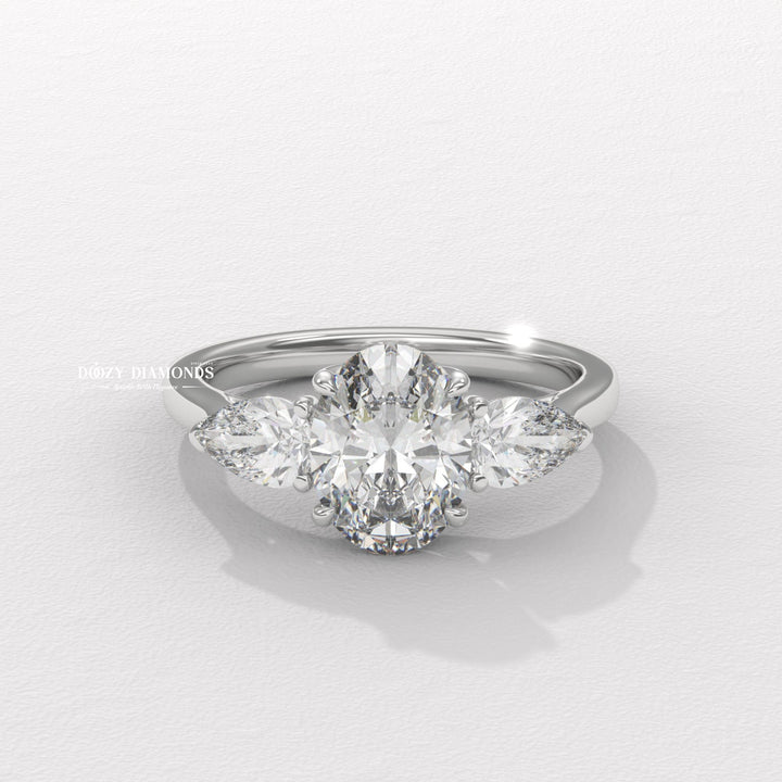 Oval three stone lab grown diamond ring side profile in gold setting