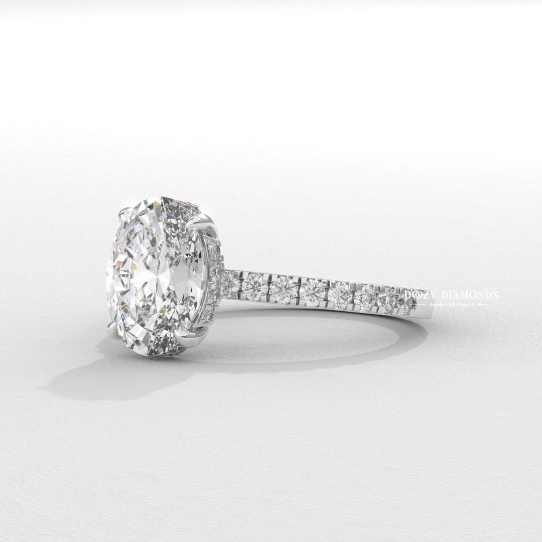 Oval hidden halo lab grown diamond ring side profile in gold setting