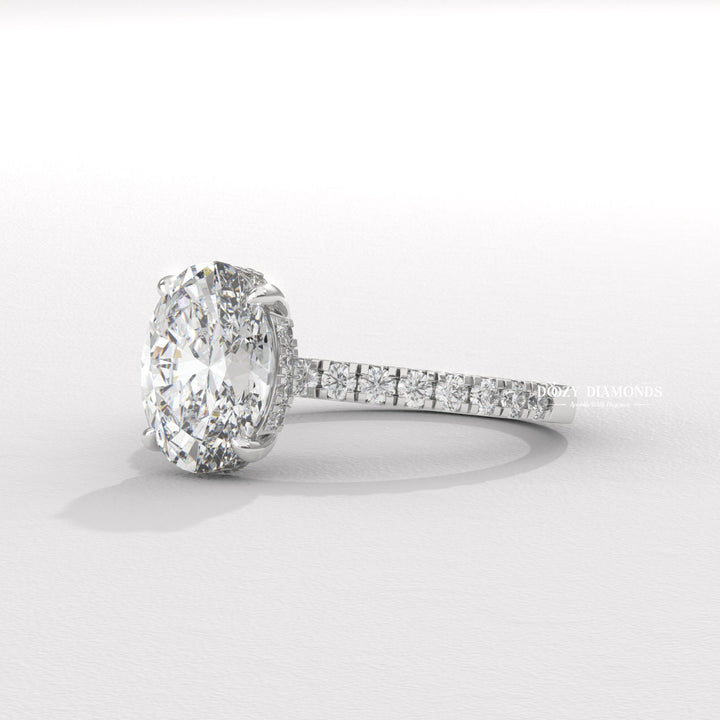 Oval hidden halo lab grown diamond ring side profile in gold setting