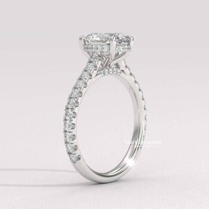 Detailed close-up of oval halo diamond engagement ring
