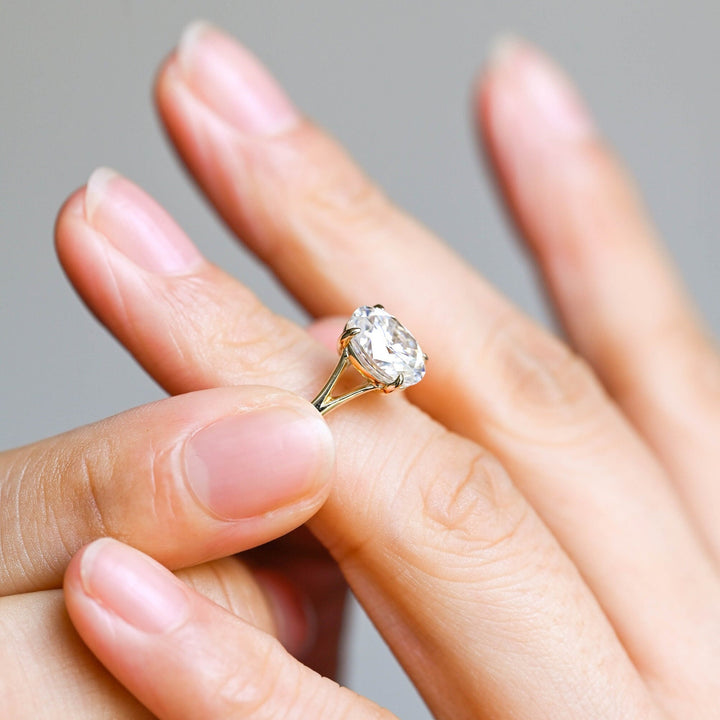 Side angle of oval split shank diamond engagement ring