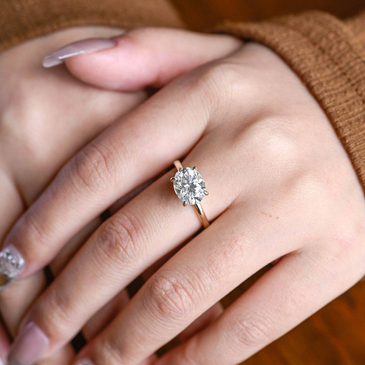Oval east west lab grown diamond ring side profile in gold setting