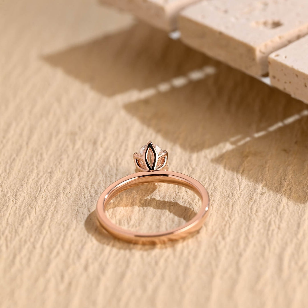 Macro shot of oval cut diamond facets in solitaire ring setting