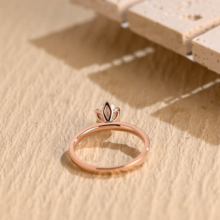 Macro shot of oval cut diamond facets in solitaire ring setting