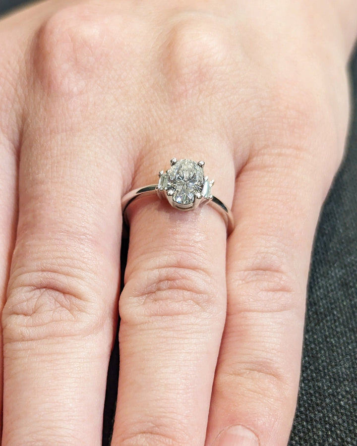 Macro shot of oval cut diamond facets in solitaire ring setting