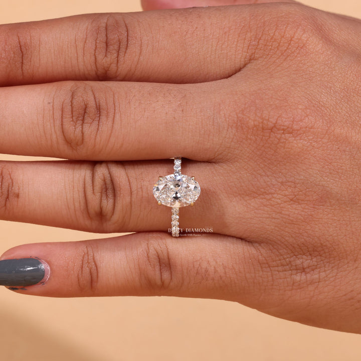 Oval hidden halo engagement ring with certified lab grown diamond